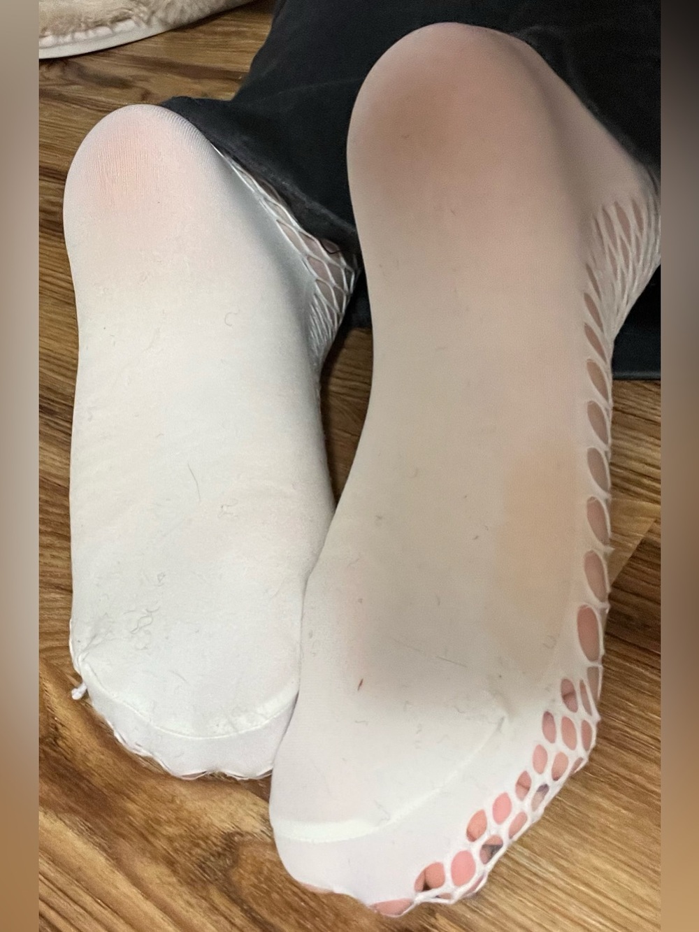 well worn white fishnet socks